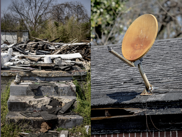 (L) The remains of a home on Speed Street in Klondike. (R ) A rusted satellite dish on boarded up home on Olympic Street. Posted on the boards is a note from the City of Memphis code enforcement department marking the home a hazardous site. 