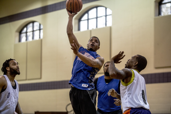 A game between the West Memphis Ballers (blue) and the Neighborhood Christian Center teams. 