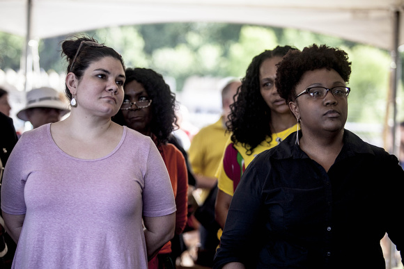 Laura Wilfong Miller (left) whose great grandmother was aunt to Antoinette Rappel and Michele Lisa Whitney (right) whose great uncle was Ell Persons had front row seats at the ceremony and joined folks on a hike to the lynching site.