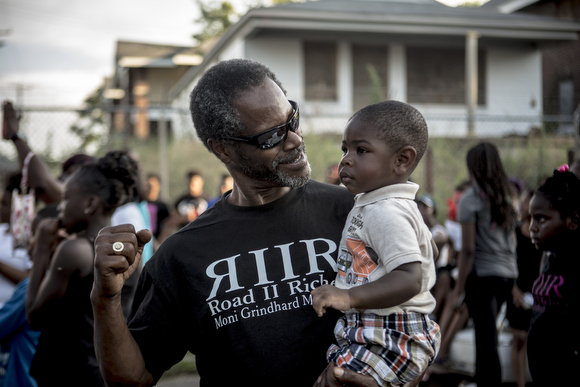 Visitors to the block party enjoy live music.