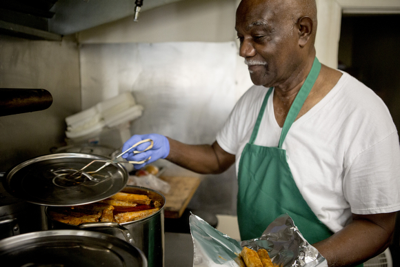 Lee Crumb serves up his beef tamales, offered in either hot or mild, at Pop's Hot Tamales on Park Avenue.