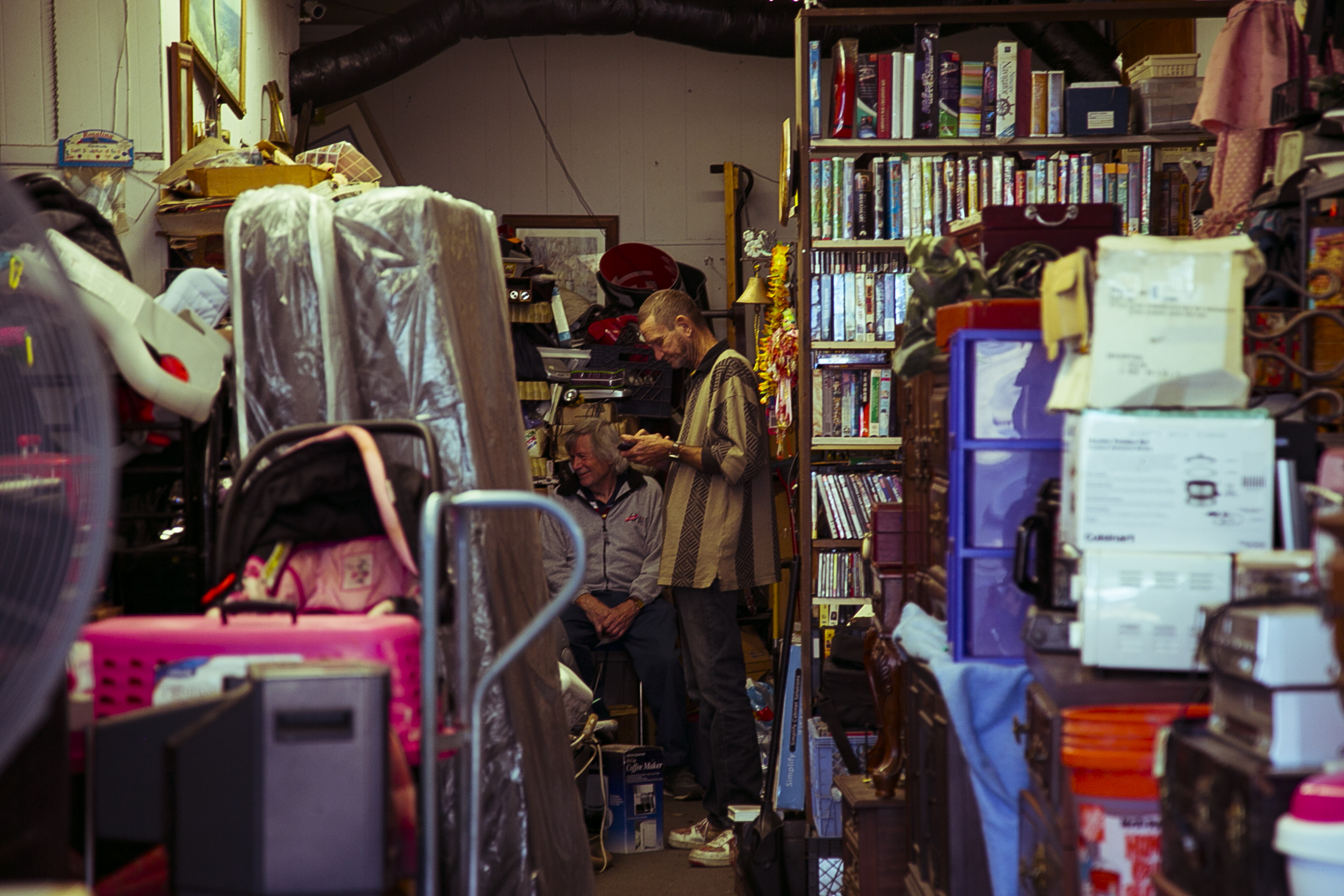 A conversation at the Mattress Shop & Unique Finds on Summer Avenue. (Natalie Eddings)