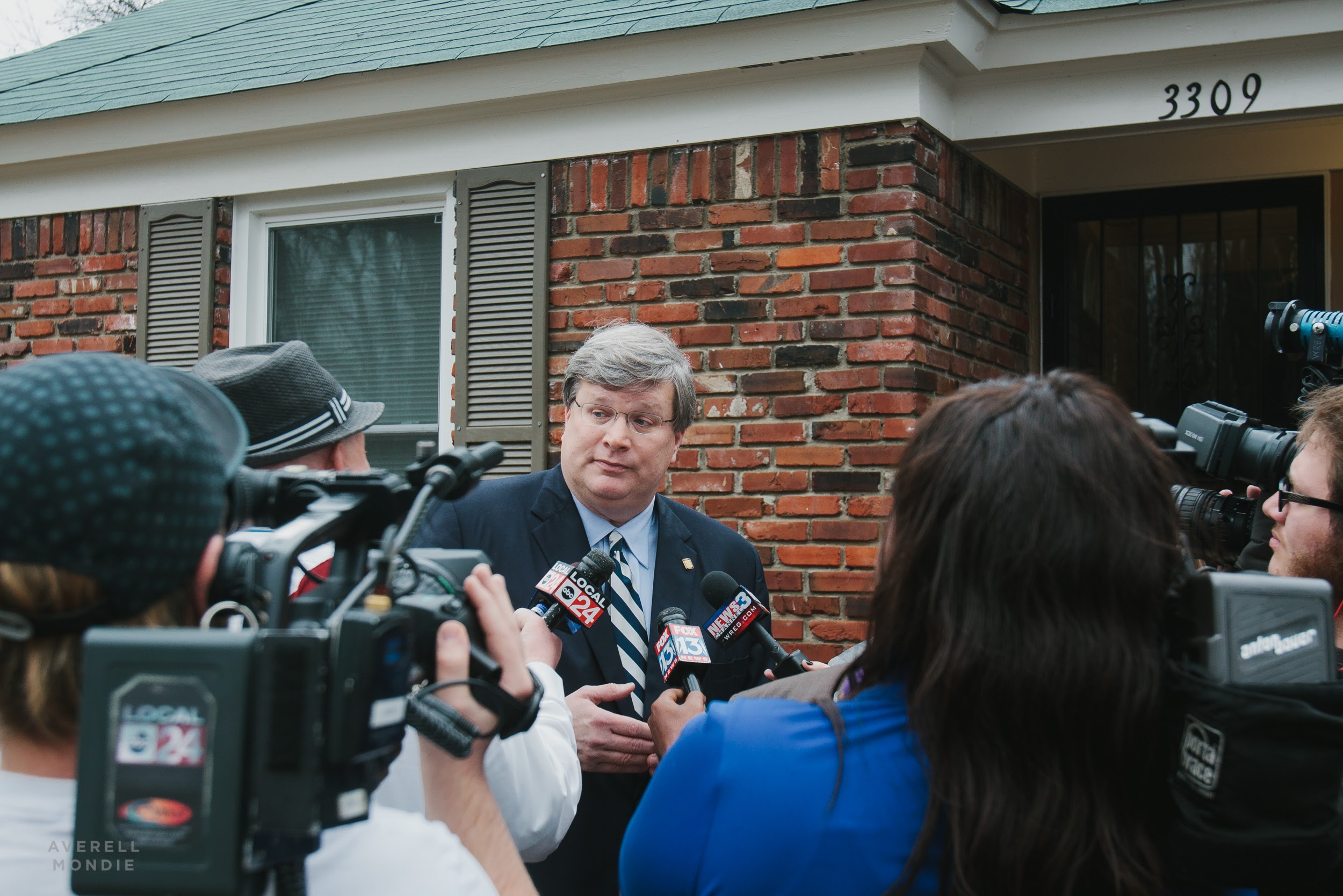 Memphis Mayor Jim Strickland was interviewed by local news outlets outside of one of the homes renovated by Frayser CDC. (Averell Mondie)