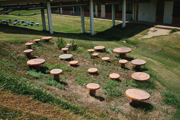 A seating arrangement located in the green space of the elementary school, which closed in 2012.