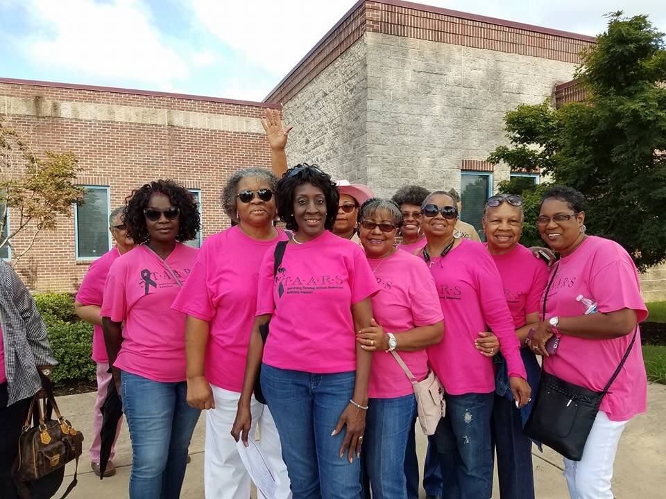 Members of STAARS pose for a group picture. Founder Barbara Davis stands at the forward center. (STAARS) 