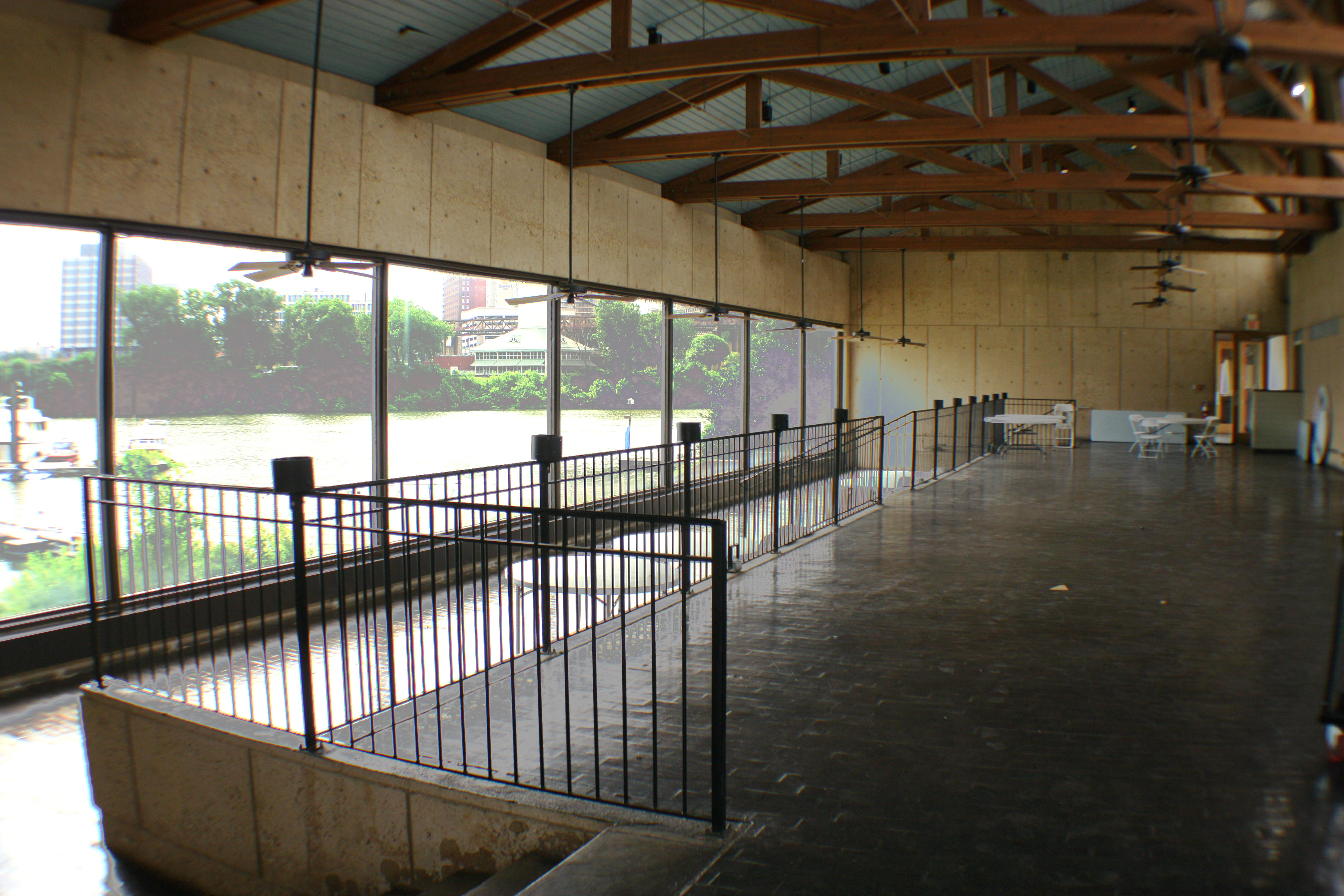 The 275 Food Project's venue space at Harbor Landing offers sweeping views of Mud Island's harbor, a bar area for more intimate gatherings and food storage and a commercial kitchen for chefs and caterers. (Cole Bradley) 