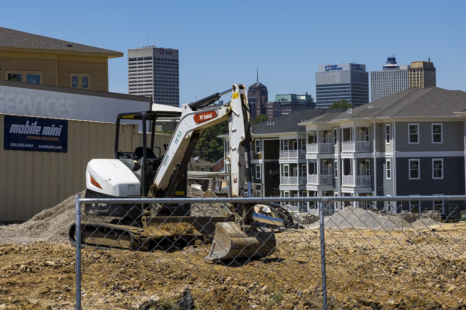 To the right, finished apartments built in the first two phases of the Foote Park at South City development are already being occupied while construction continues on phase three in the foreground. The project has six phases. (Ziggy Mack) 