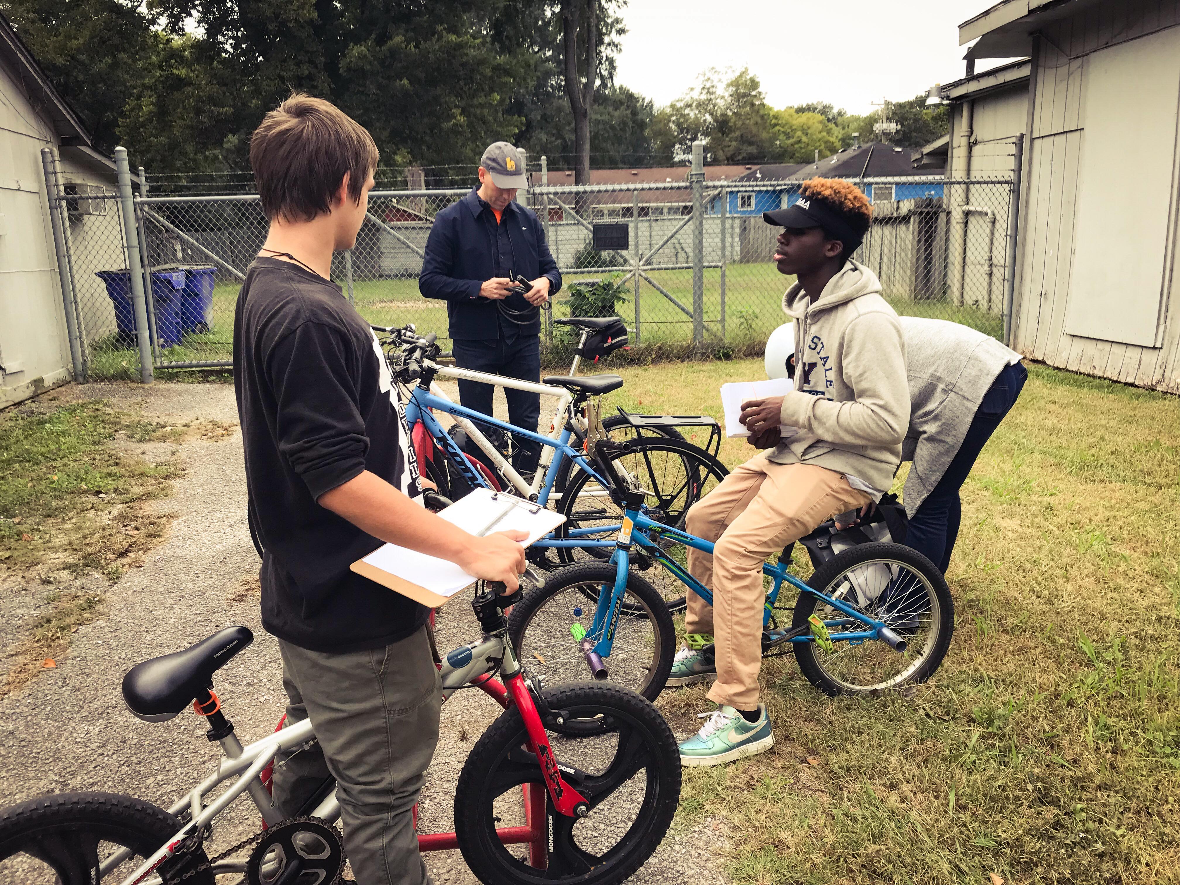 High school interns and members of Like Riding a Bicycle set off to canvas the neighborhood. (Cole Bradley)