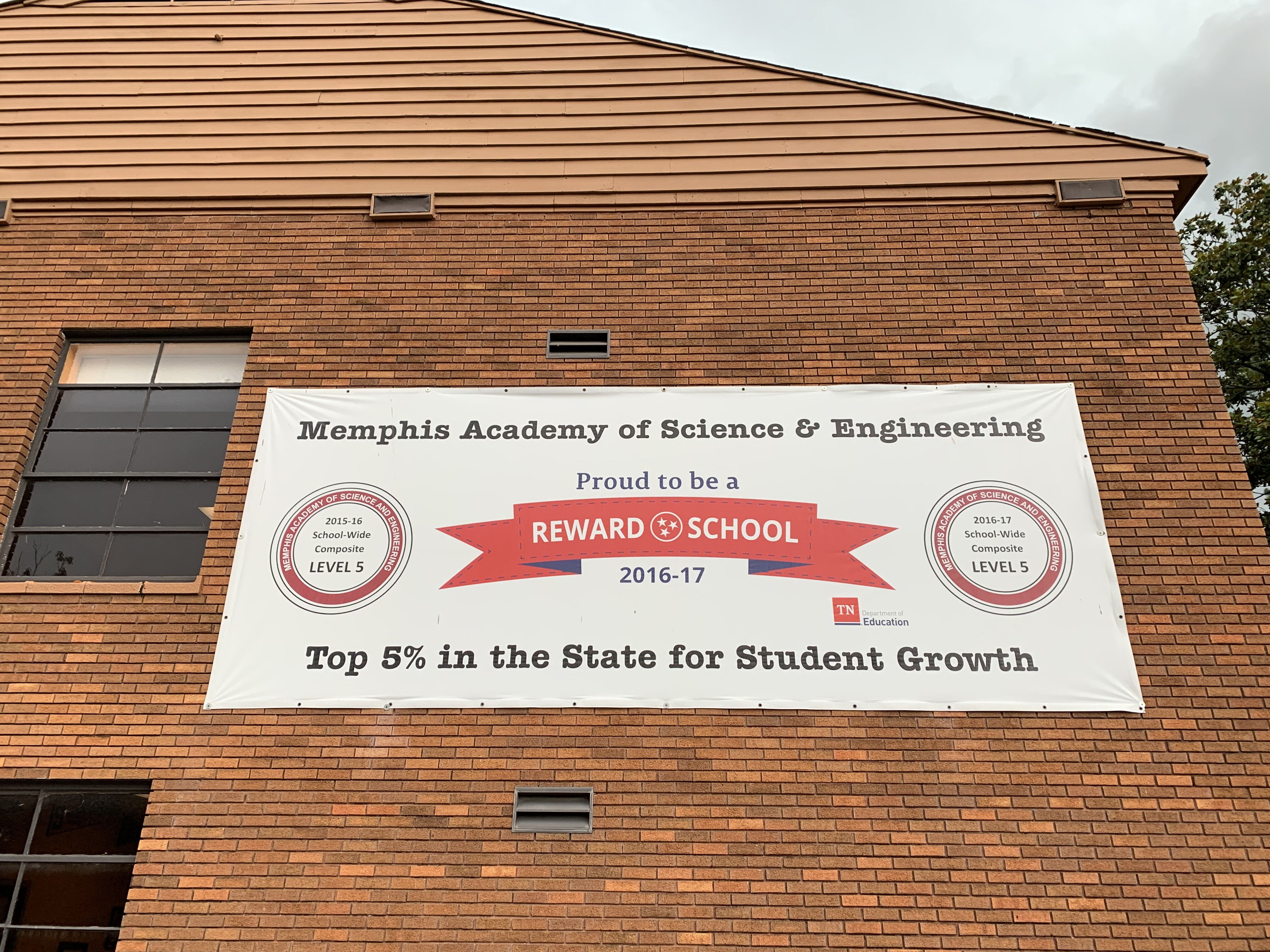 A banner displayed on the MASE campus highlights its recent successes. (Jeff Hulett)