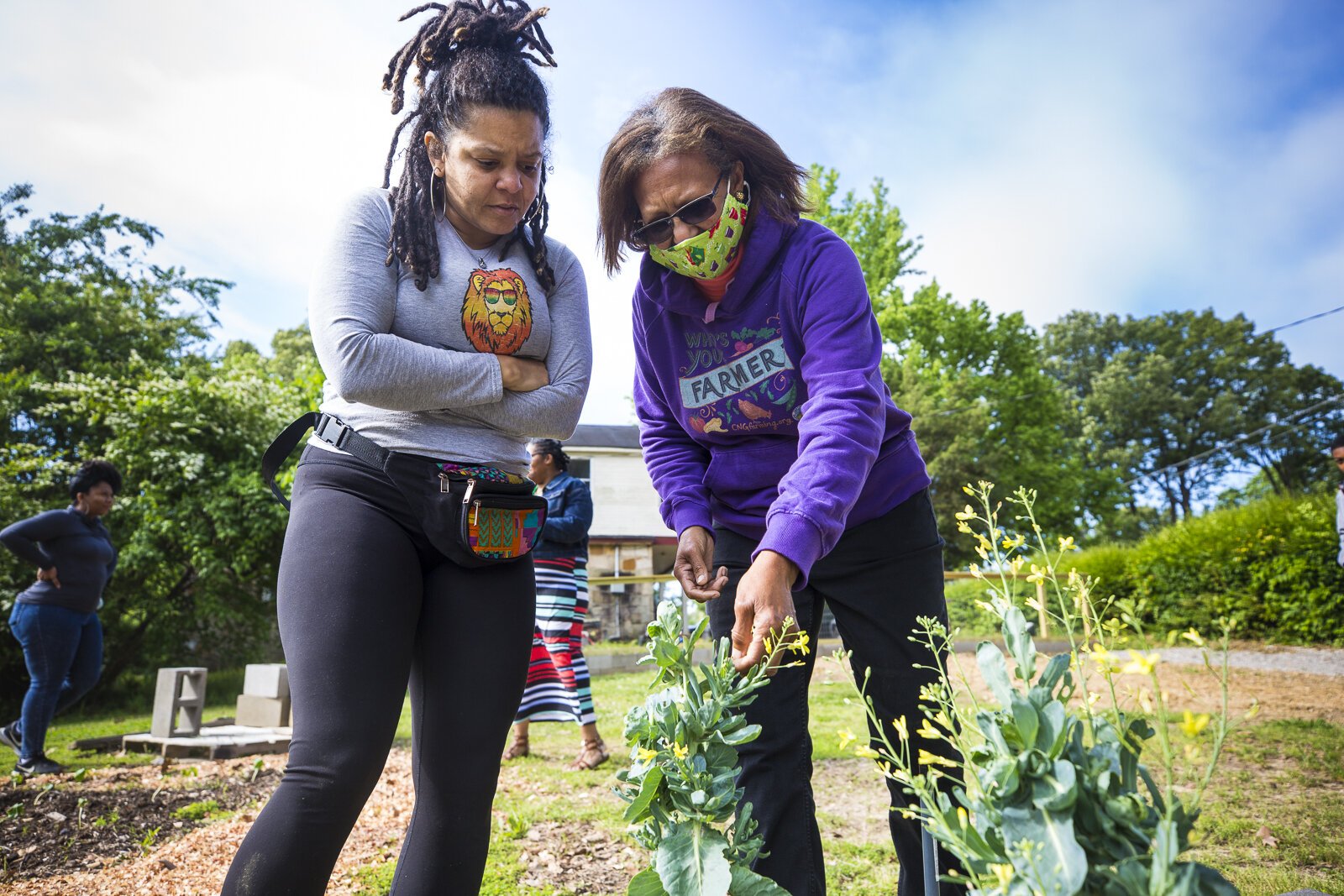 Rachel Jones (left) and Debra Lockard at the Orange Mound Orchard and urban garden, May 2021. (Ziggy Mack)