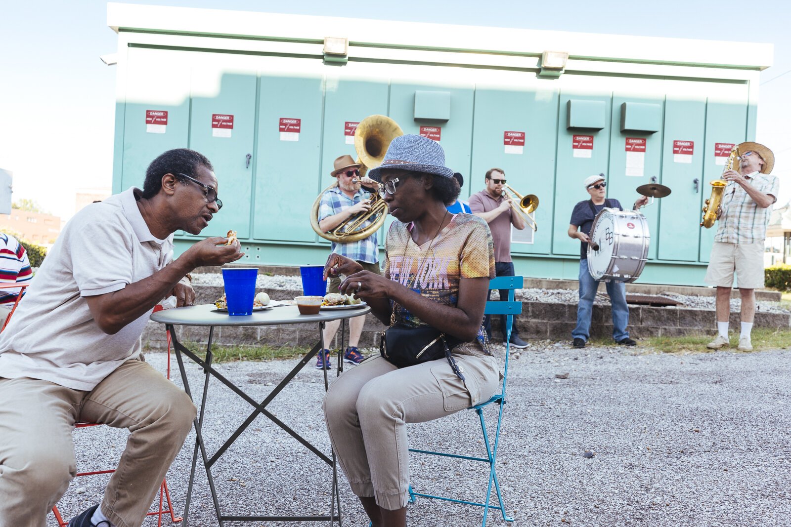 Residents of Madison Heights enjoy food from neighborhood restaurants while the Mighty Souls Brass Band plays an upbeat jazz number. (Ziggy Mack) 