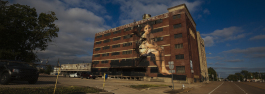 As part of the Brooks Outing project, artist Julien de Casabianca pasted "characters" from earlier artworks in suprising places across Memphis. This snippet of "Au pied de la falaise" can be seen on Crump Boulevard. (Ziggy Mack)