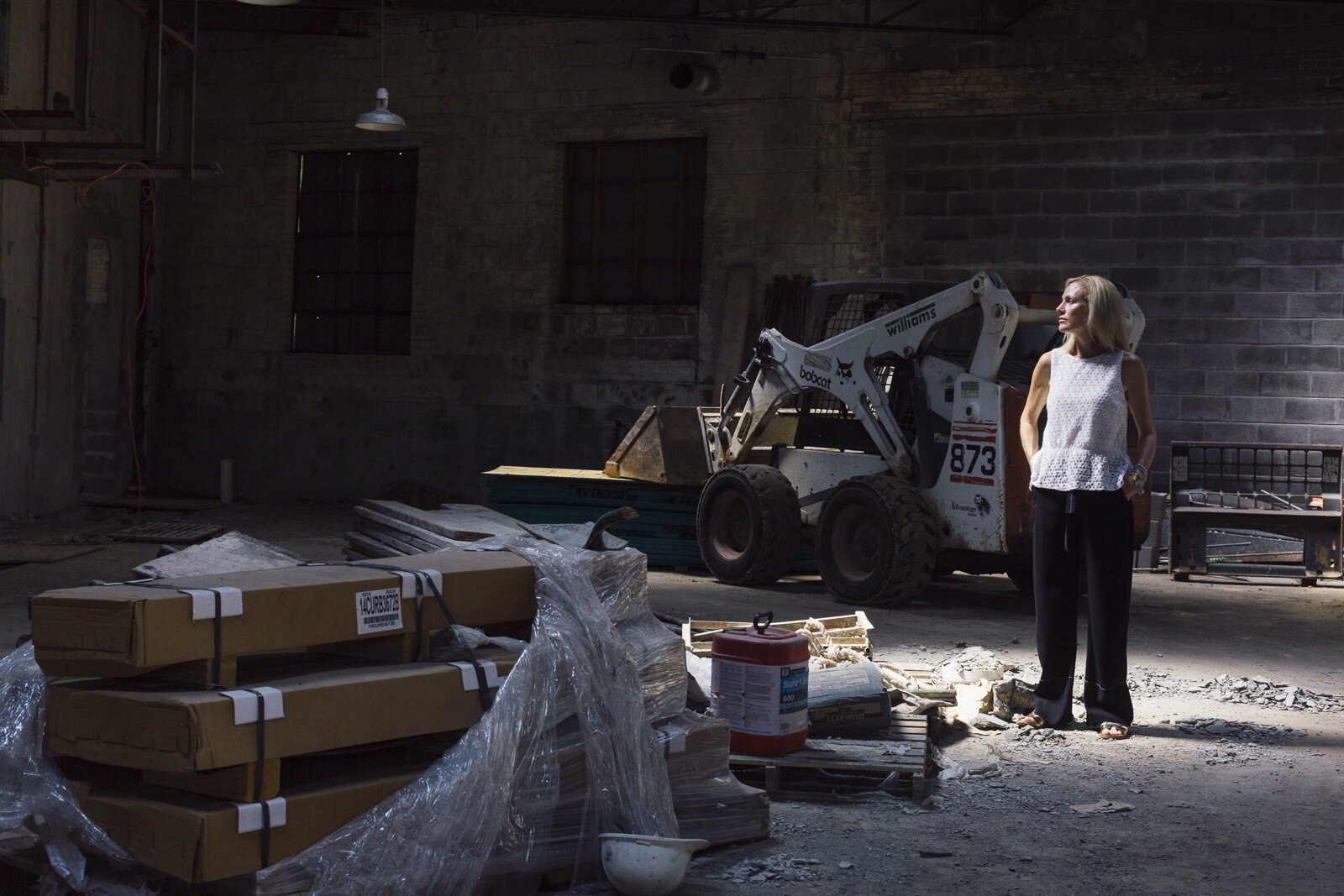 Currently under renovation, Karen Adams surveys what will soon be the production and administrative home to Karen Adams Design. (Ziggy Mack)