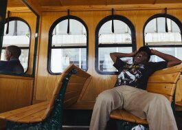Self-identified street activist and Madison trolley line passenger Larry White yawns big between conversations with other passengers. (Ziggy Mack)