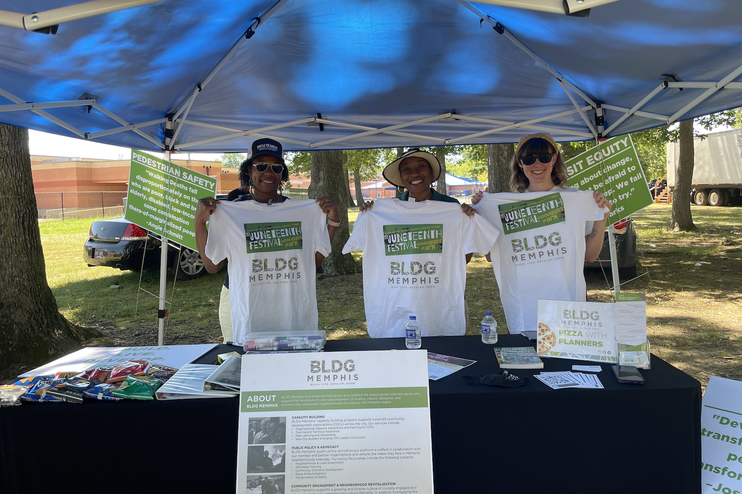 Charia Jackson, Frayser CDC Deputy Director, Courtney Thomas, BLDG Memphis Advocacy Manager, and Rachel Starks, Seeding Success Community Development Analyst (L to R), at the Juneteenth Freedom and Heritage Festival on Sunday, June 19, 2022.