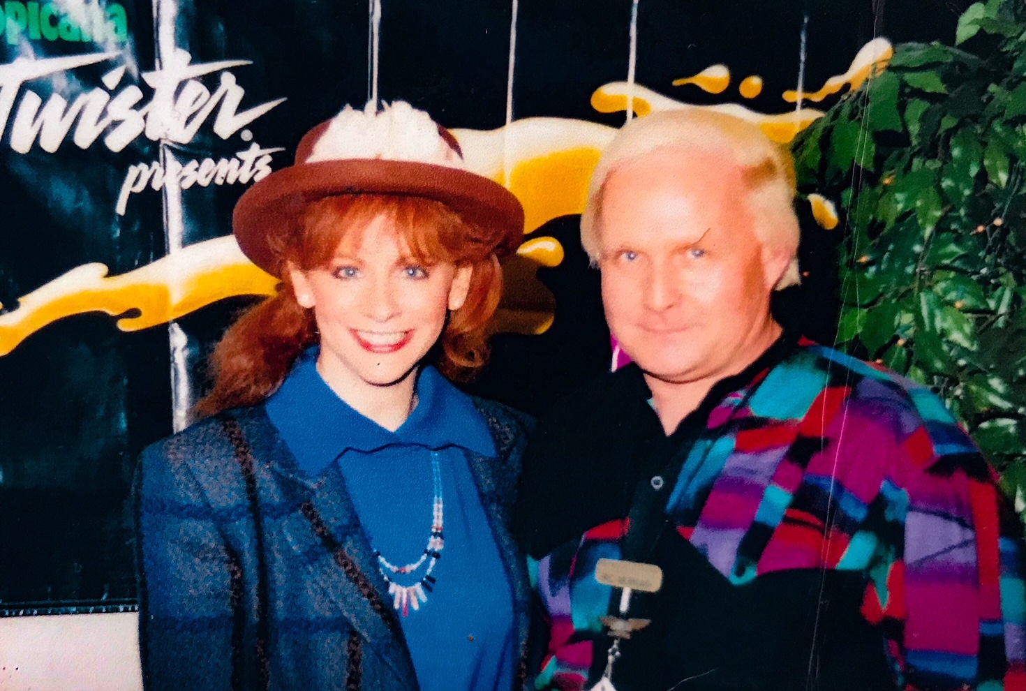 Ric Morgan (R) poses with Reba McEntire at a concert in 1994. Morgan says he was McEntire’s touring caterer for 10 years. (submitted by Ric Morgan)