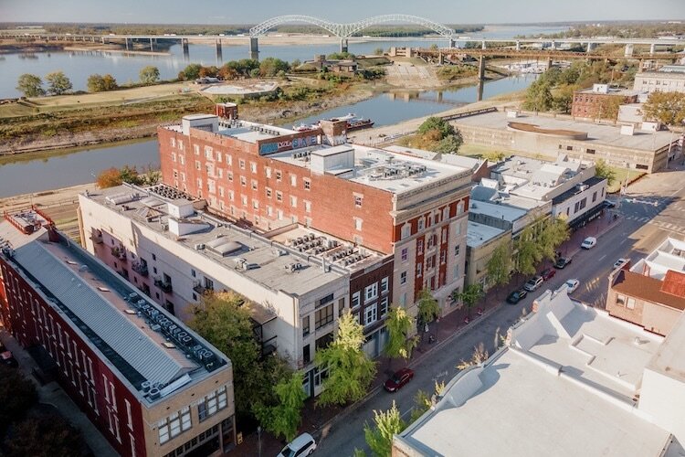 The Joseph N. Oliver Building (center) and the Stewart Building (to its left) were rehabilitated as the 99 Front mixed-use development on Cotton Row.