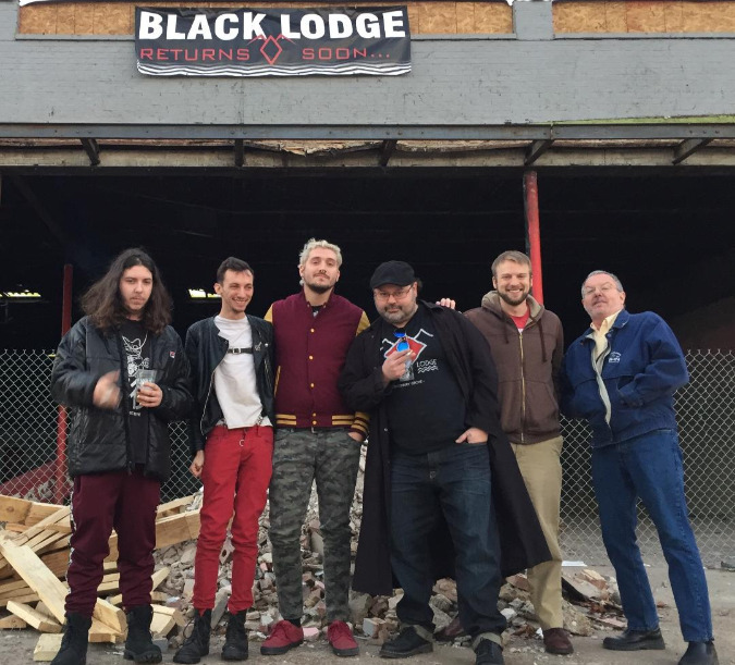 The six primary owners of Black Lodge at the new location at 405 N. Cleveland Avenue.