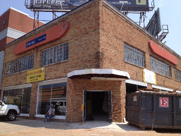 Demolition work is underway at the former White Way Pharmacy building near to Crosstown Concourse.