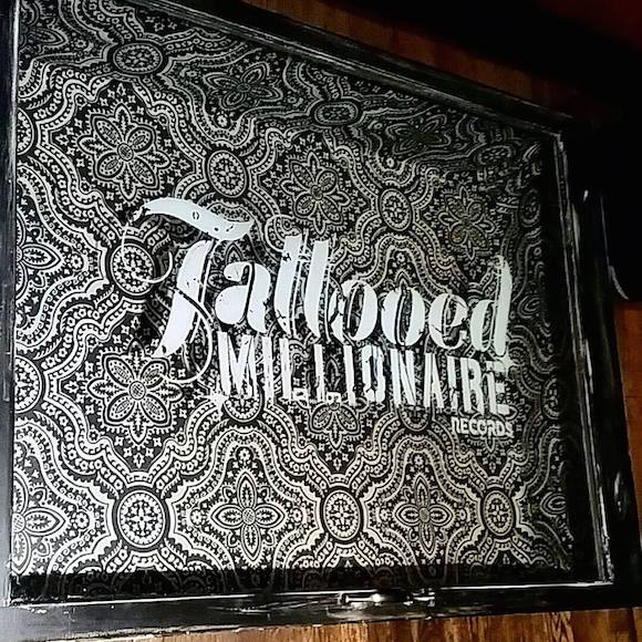 tattooed millionaire