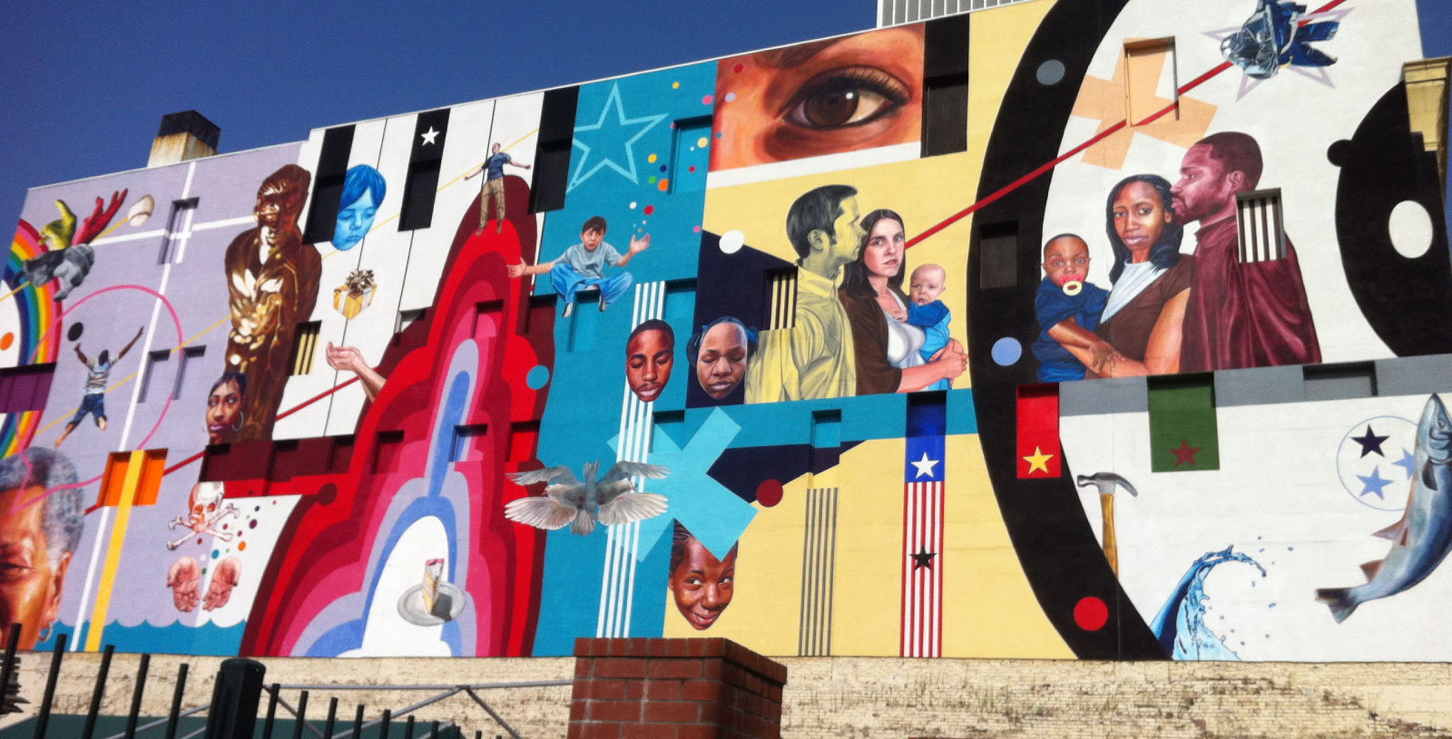 Local artists and world-renowned artist Jeff Zimmerman created the "A Note for Hope" mural on the Toof building's east wall