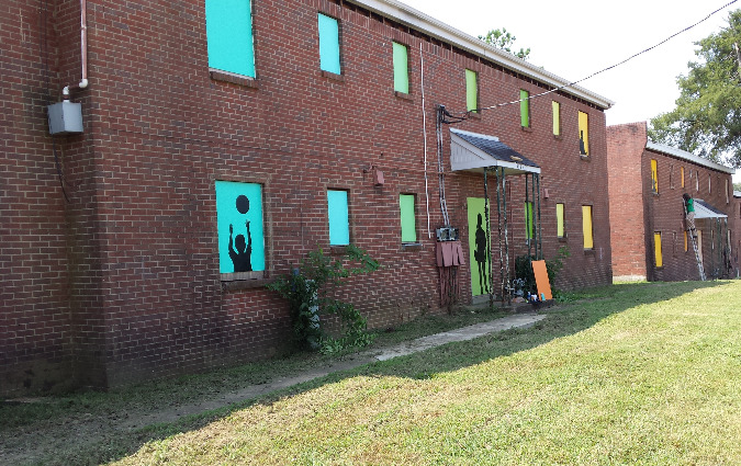 Artwork by MLK Prep students livens up the property during its renovation.