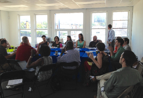 Community stakeholders and planners discuss ways to activate storefronts near Madison Avenue and Cleveland Avenue.