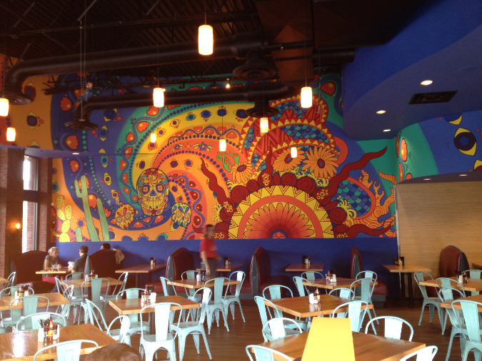 The restauarant's interior features a colorful Day of the Dead theme.