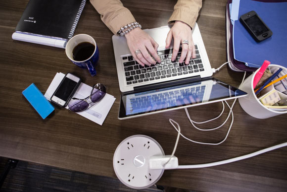 Freelancers and entrepreneurs work in shared space at CoWork. 