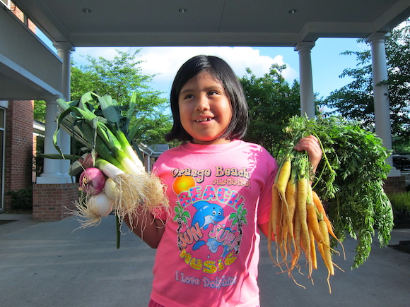 Elaine Parker, age 7, and her mother, Jennifer Parker, are members of Bring's It's weekly CSA subscription service