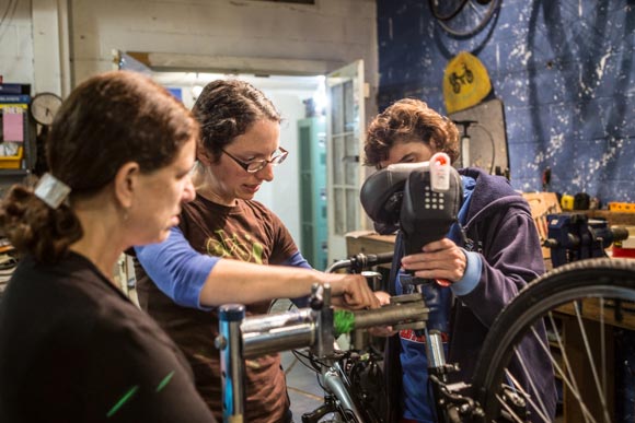 Revolutions offers instruction on bike repair in their shop