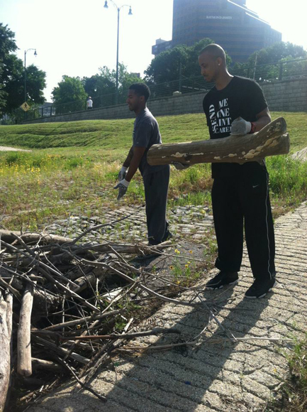Cryer (left) and STS assist with a local community clean-up effort