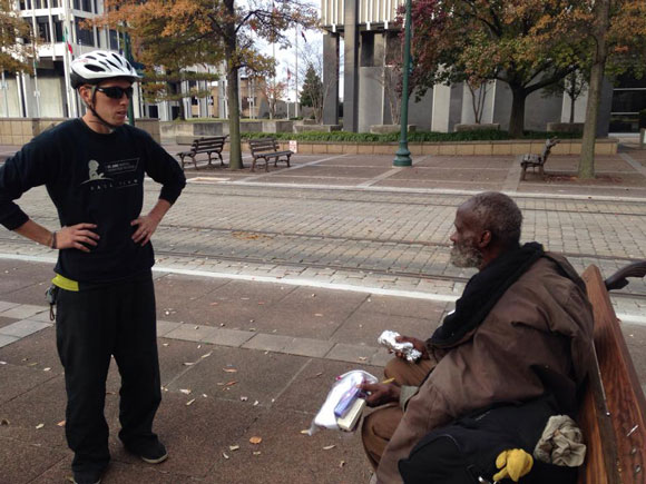 A UBFM rider delivers burritos to man on Main Street