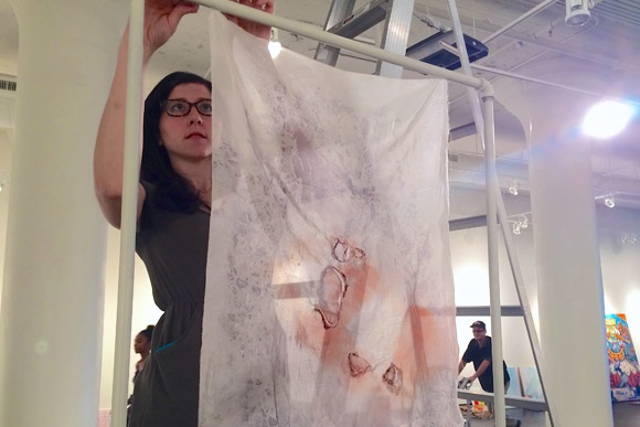 Jenna David installs her work at the Hyde Gallery