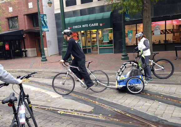 UBFM rider carts fresh burritos and water to those in need