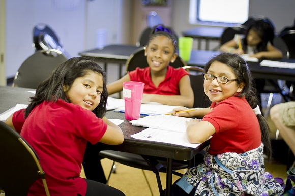 Leidy Hernandez, Jerlaysia Johnson and Yessica Carrillo work on their academics at MAM