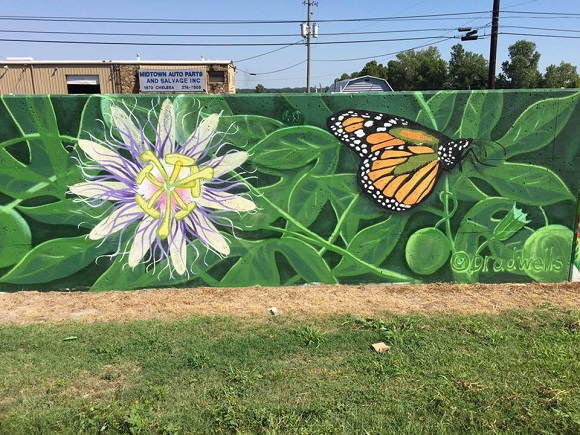 This panel by mural artist Brad Wells was completed last year on the south side of the flood wall along the Chelsea Greenline and was retained as a memorial tribute to him