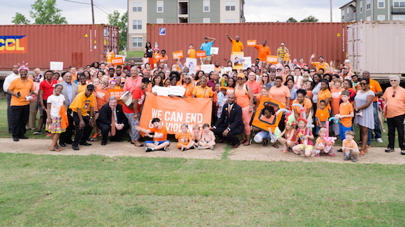 Guests posing with Mayor Strickland and Senator Lee Harris