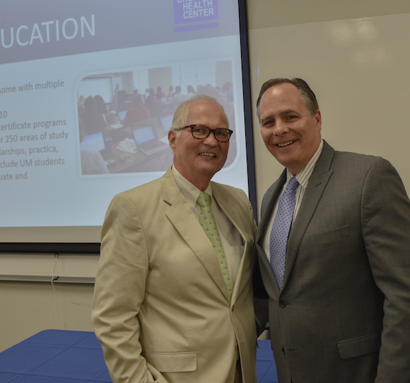 Dr. Scott Morris, CEO of the CHC, and Dr. David Rudd, president of U of M, signing the agreement