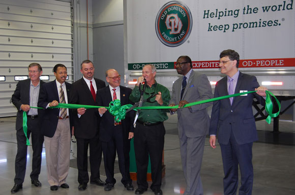 State and local officials help cut the ribbon at the new Old Dominion service center on October 15