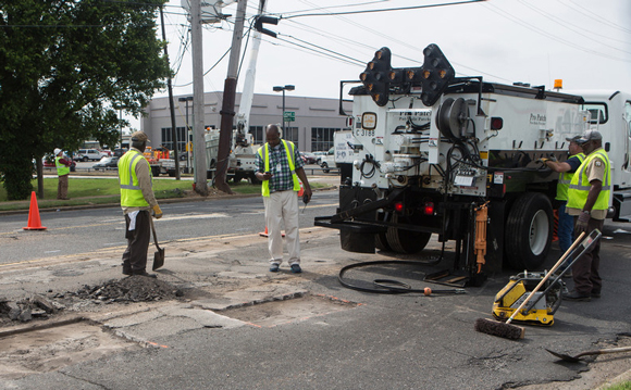 Crew uses new Pro-Patch truck for repair last week at Getwell at E. Mallory