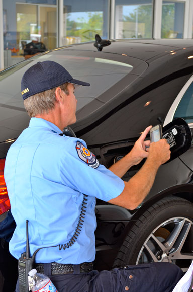 Collierville early responder reads QR code on inside gas cap of Mercedes-Benz