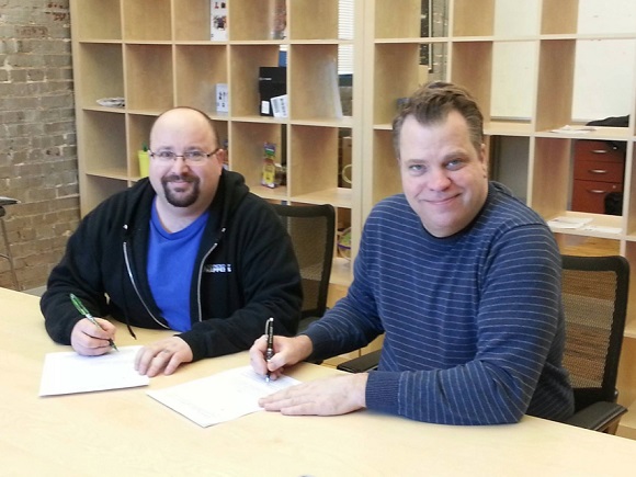 Technology Happens and MVP founder and CEO Mike Blumenthal (left) and AVP of Research and Development Mike Trevarthan sign the patent applications for MVP