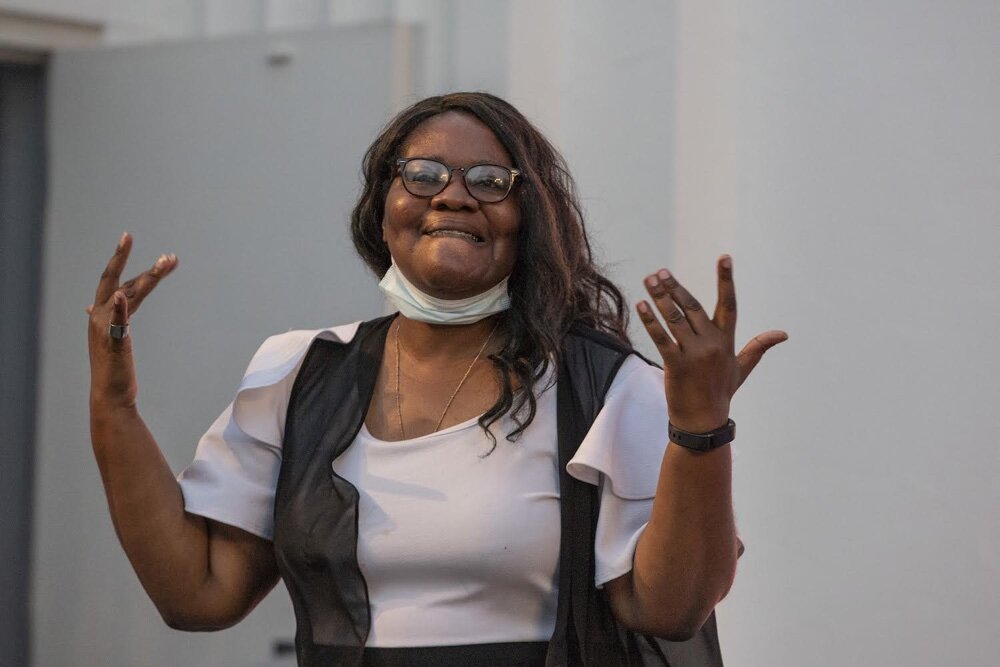 ASL interpreter Tekosha Johnson onstage at the Overton Park Shell.