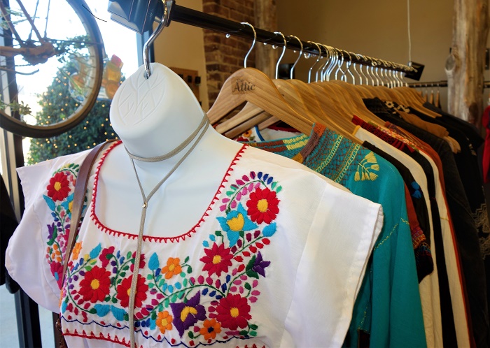 Colorful Mexican-inspired clothing, ceramics, clutches and other items from Mucho, one of the vendors whose items are available through the month of December at The Attic in Overton Square. (Aisling Maki)