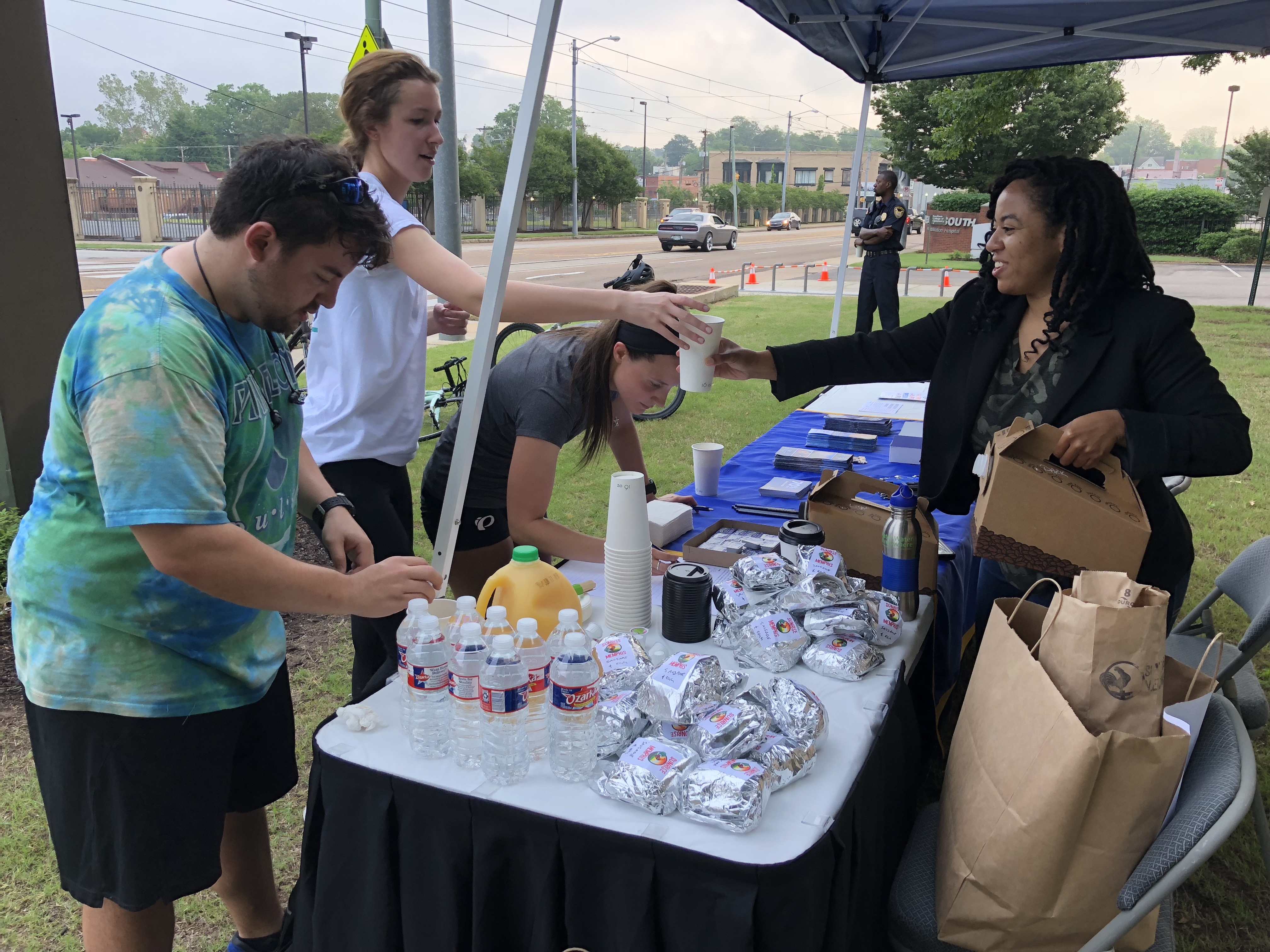 Students and faculty at the Southern College of Optometry participate in the 2018 Bike to Work Day, which included food and festivities at an outdoor registration table. (Submitted)