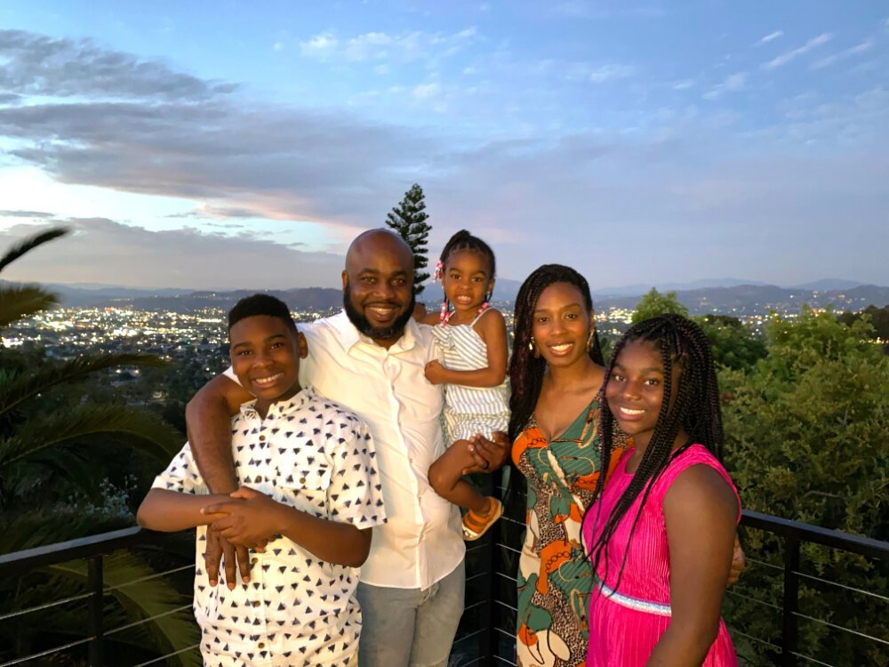 Andrzej "AJ" Bloomfield Jr., 11, poses with his family. L to R: AJ, Andrzej Sr., Alayla (held) Kimeka, and Victoria. (Submitted)