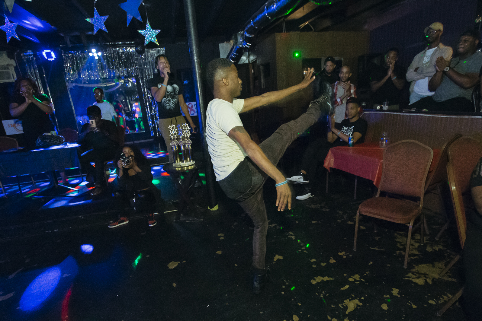 Club patrons dance and vogue as part of a Kiki Ball at Club Memphis.