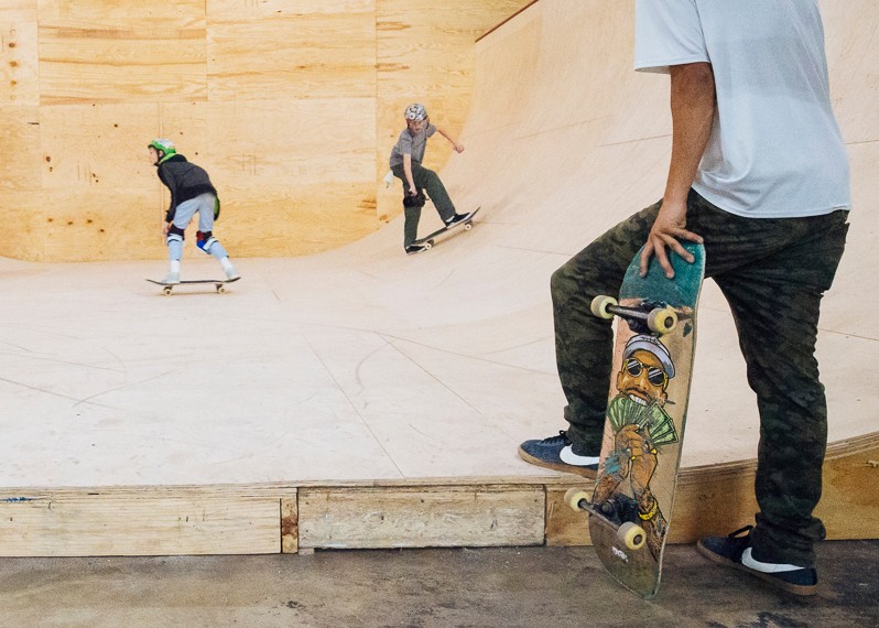 Young skateboarders try their luck at the bottom half of Society Skatepark and Coffee's 10-foot vert ramp. After this photo was taken, a mural was installed by local artist Frances Berry. (Ziggy Mack) 