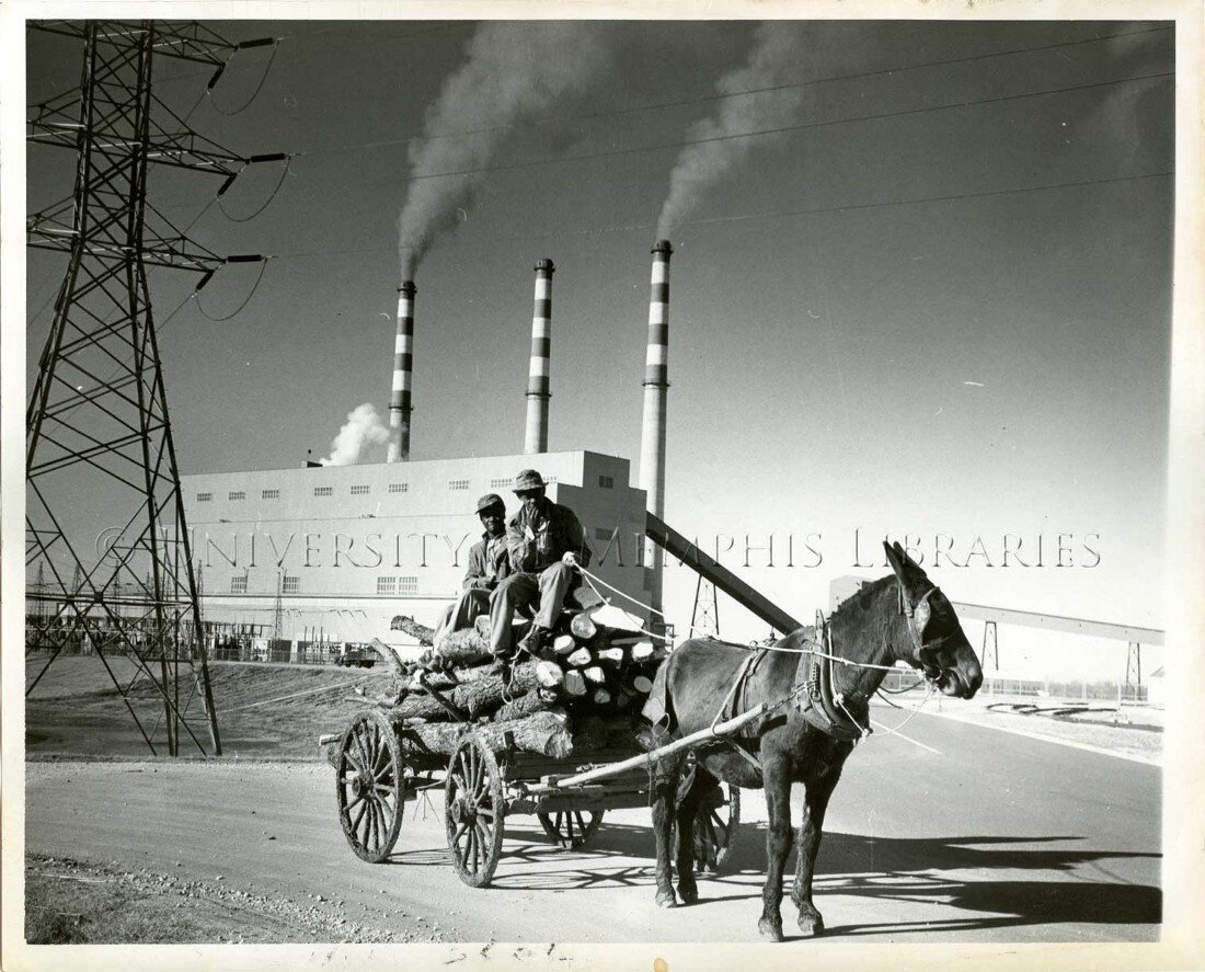 In Boxtown, two men sit on a horse-drawn carriage after collecting wood to warm their houses; 1960. After decades of industrial pollution, Byhalia Pipeline LLC wants to move crude oil under Boxtown. (University of Memphis Libraries, Ken Ross)